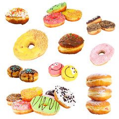 Collage of tasty donuts isolated on white