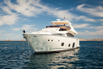 Fototapeta na wymiar Expensive White Yacht Anchored
