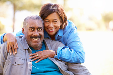 Outdoor Portrait Of Loving Senior Couple