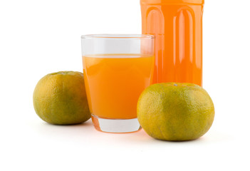 Glass and bottle of orange juice