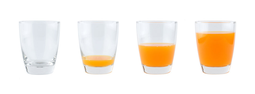 Four glasses of orange juice