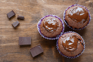 three chocolate Cupcake