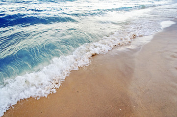 Soft wave of the sea on the sandy beach