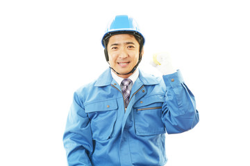 ガッツポーズの作業員