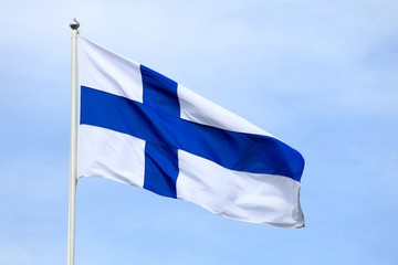 Flag of Finland against Pale Blue Sky