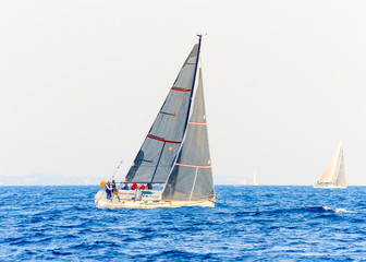 Fototapeta premium Sailing boat during a regatta out of Poros island in Greece