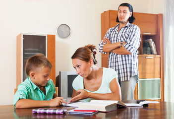 Ordinary family doing homework