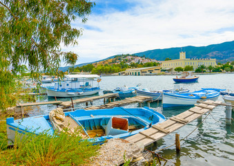 Naklejka na ściany i meble Wooden pier with fishing boats at Poros island in Greece