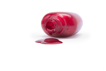 spilled nail polish in pearl red color