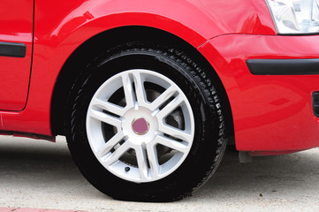Obraz na płótnie Canvas Alloy wheel on a modern car