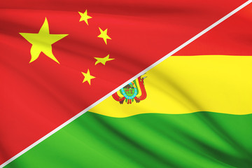 Series of ruffled flags. China and State of Bolivia.