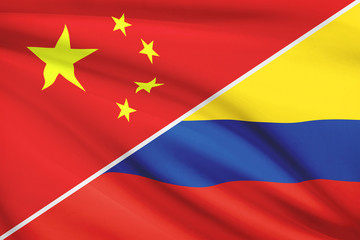 Series of ruffled flags. China and Republic of Colombia.