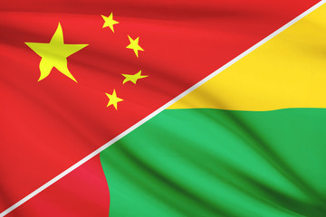 Series of ruffled flags. China and Republic of Guinea-Bissau.