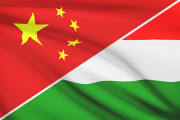 Series of ruffled flags. China and Hungary.