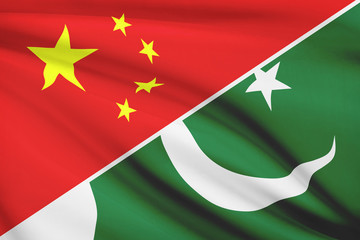 Series of ruffled flags. China and Islamic Republic of Pakistan.