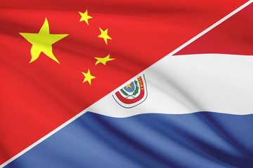 Series of ruffled flags. China and Republic of Paraguay.