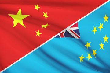 Series of ruffled flags. China and Tuvalu.