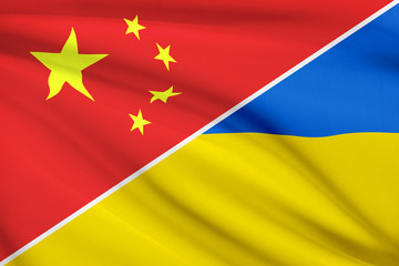Series of ruffled flags. China and Ukraine.