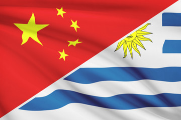 Series of ruffled flags. China and Oriental Republic of Uruguay.
