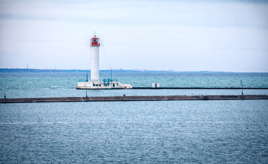 Vorontsovsky lighthouse near a pier in Odessa port, Ukraine