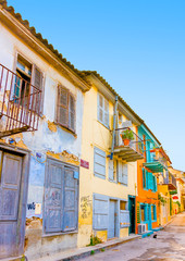 Narow road with old buildings in Nafplio town in Greece