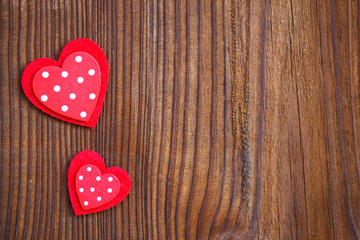 Fototapeta premium red hearts on wooden board