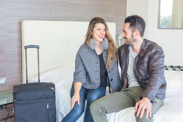 Young Couple Relaxing at Hotel Room