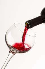 glass of red wine on white background