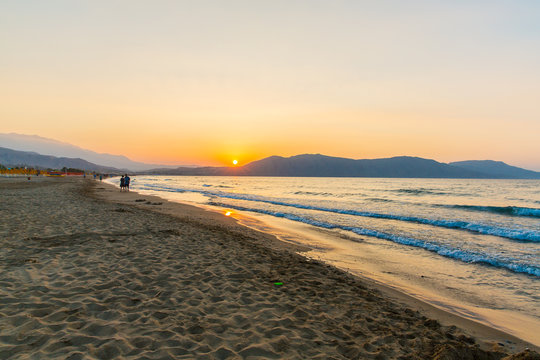 Beach on sunset in village Kavros in Crete  island, Greece