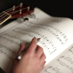 woman who studies musical score