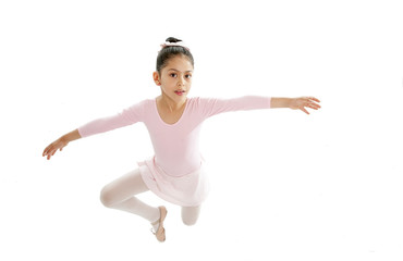 young cute ballet dancer girl dancing classical in pink tutu © Wordley Calvo Stock