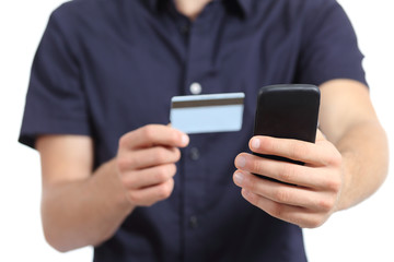 Man hands shopping on the smart phone with a credit card