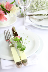 Table setting with spring flowers close up