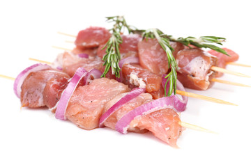 Raw pork kebab isolated on white