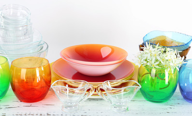 Different tableware on shelf, isolated on white