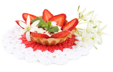 Tasty tartlet with strawberries isolated on white