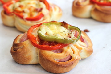 Pizza with pepper, ham, on white paper