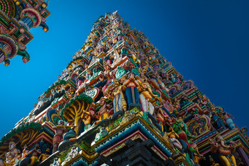 Facade of a Hindu temple in Sri Lanka with sculptures of deities - obrazy, fototapety, plakaty