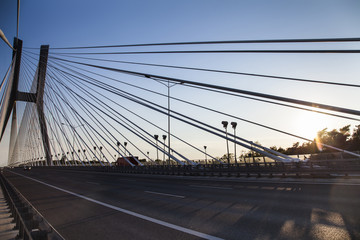 Beautiful photo of a rope bridge at sunset