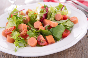 vegetable salad and sausage