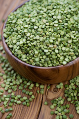 Vertical shot of split dried green peas, close-up