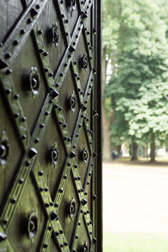Hammered gate opened to the park