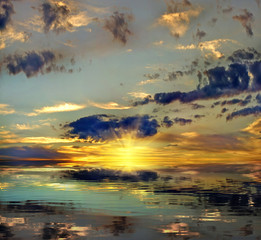 image of sunset sky over the water