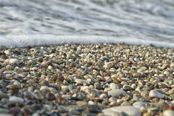Small pebbles and waves