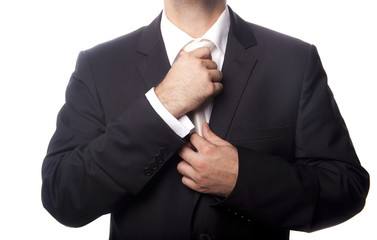 Businessman Adjusting Tie