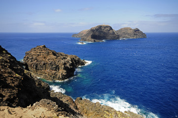 Fototapeta na wymiar Island in the blue