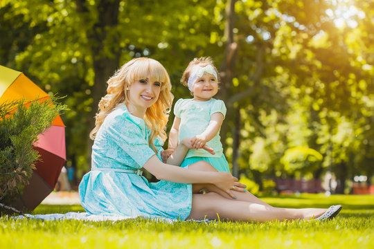 Mother with daughter in the park