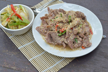 Beef Bulgogi - Korean marinated BBQ beef served with kimchi, ssa