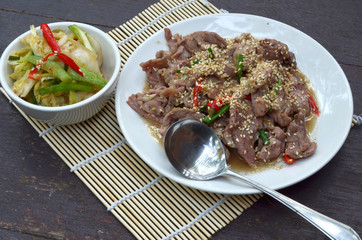 Beef Bulgogi - Korean marinated BBQ beef served with kimchi, ssa