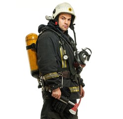 Firefighter with axe and oxygen balloon isolated on white